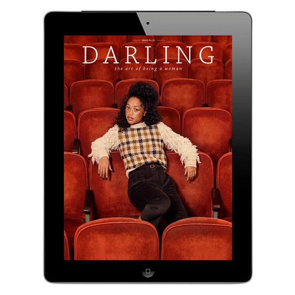 An image of a online magazine cover with a girl on a e-Reader