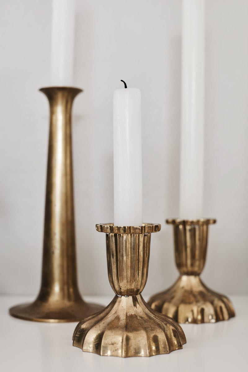 A set of three candles of different heights