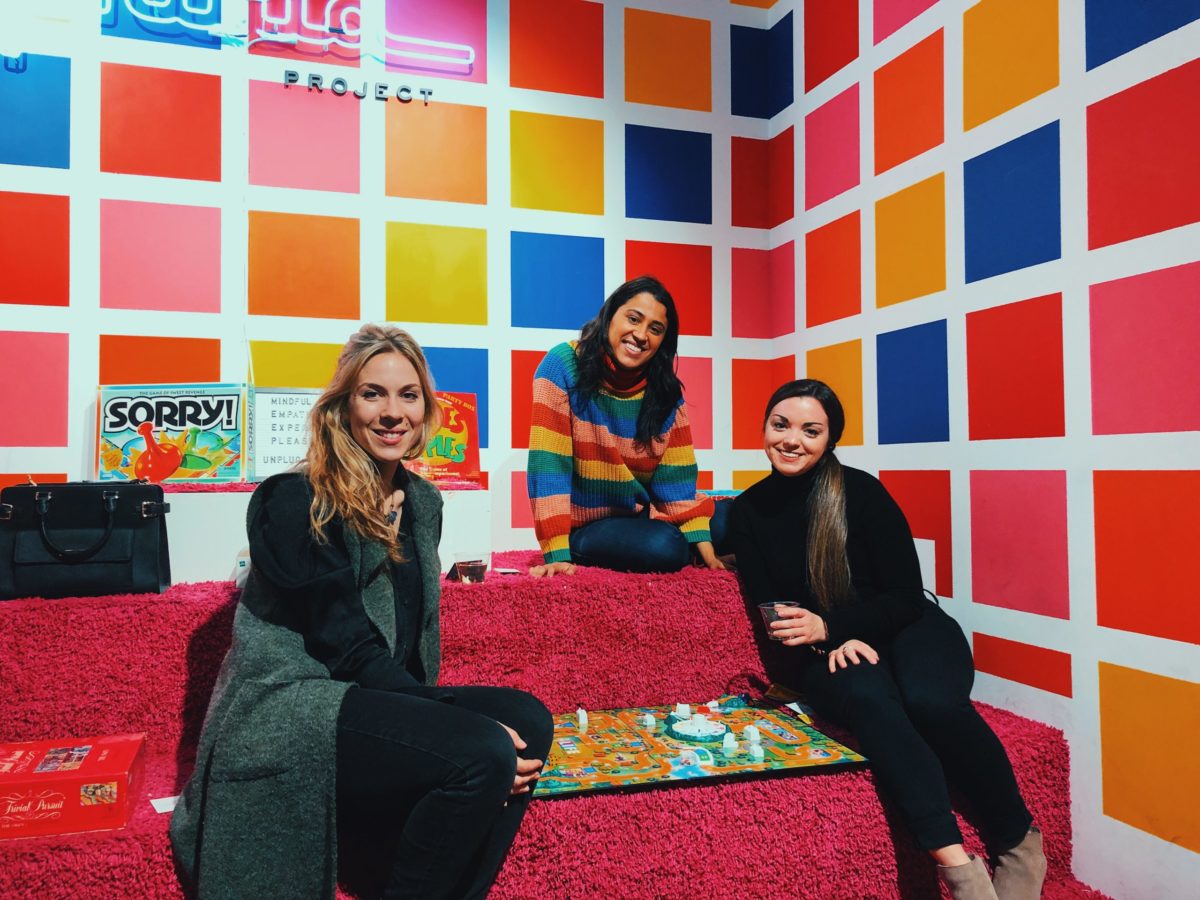A group of women playing a board games