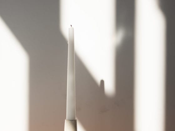 A candle on a table