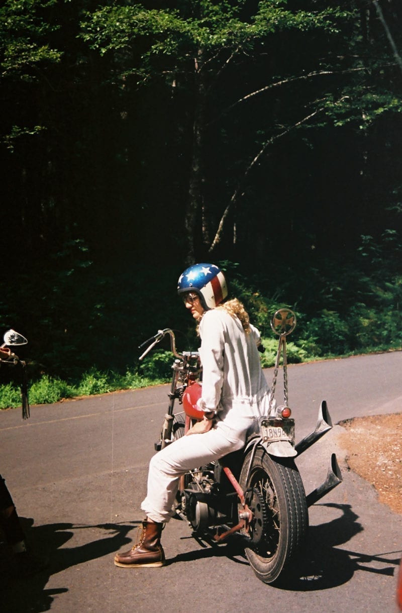 A woman on a motorcycle
