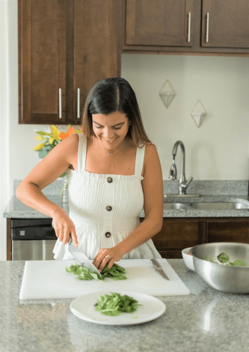 A woman chopping vegetables