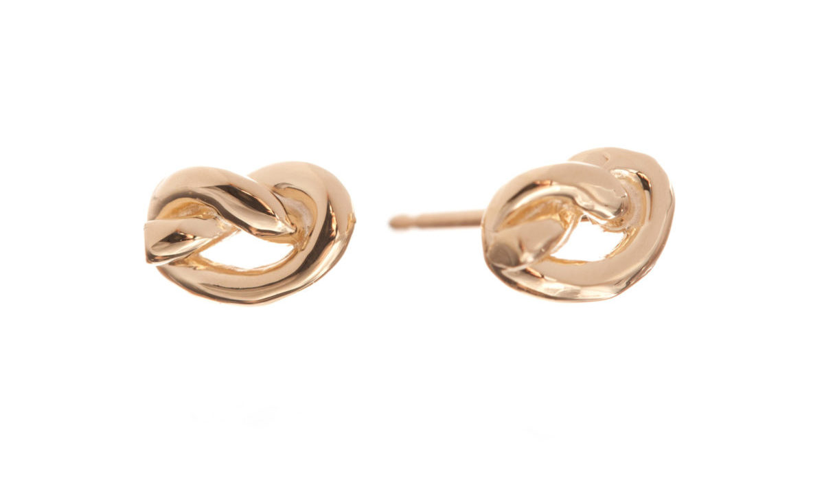 A pair of knot gold earrings