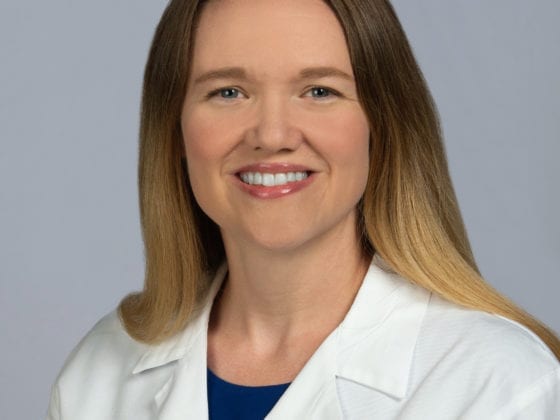 A female doctor in her medical jacket