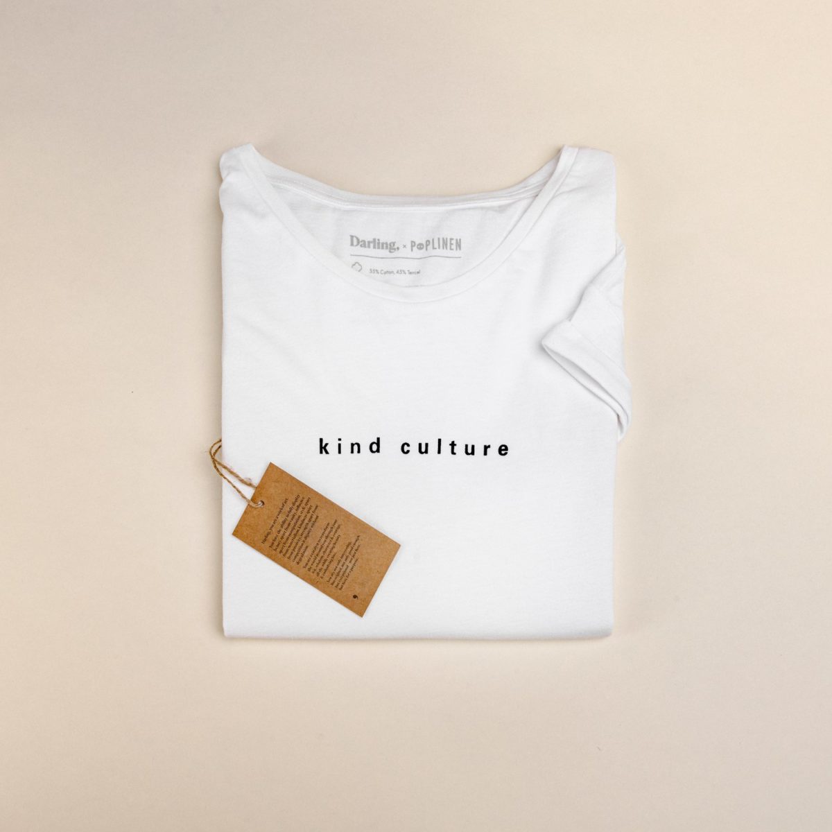 A folded t-shirt that says "Kind Culture"