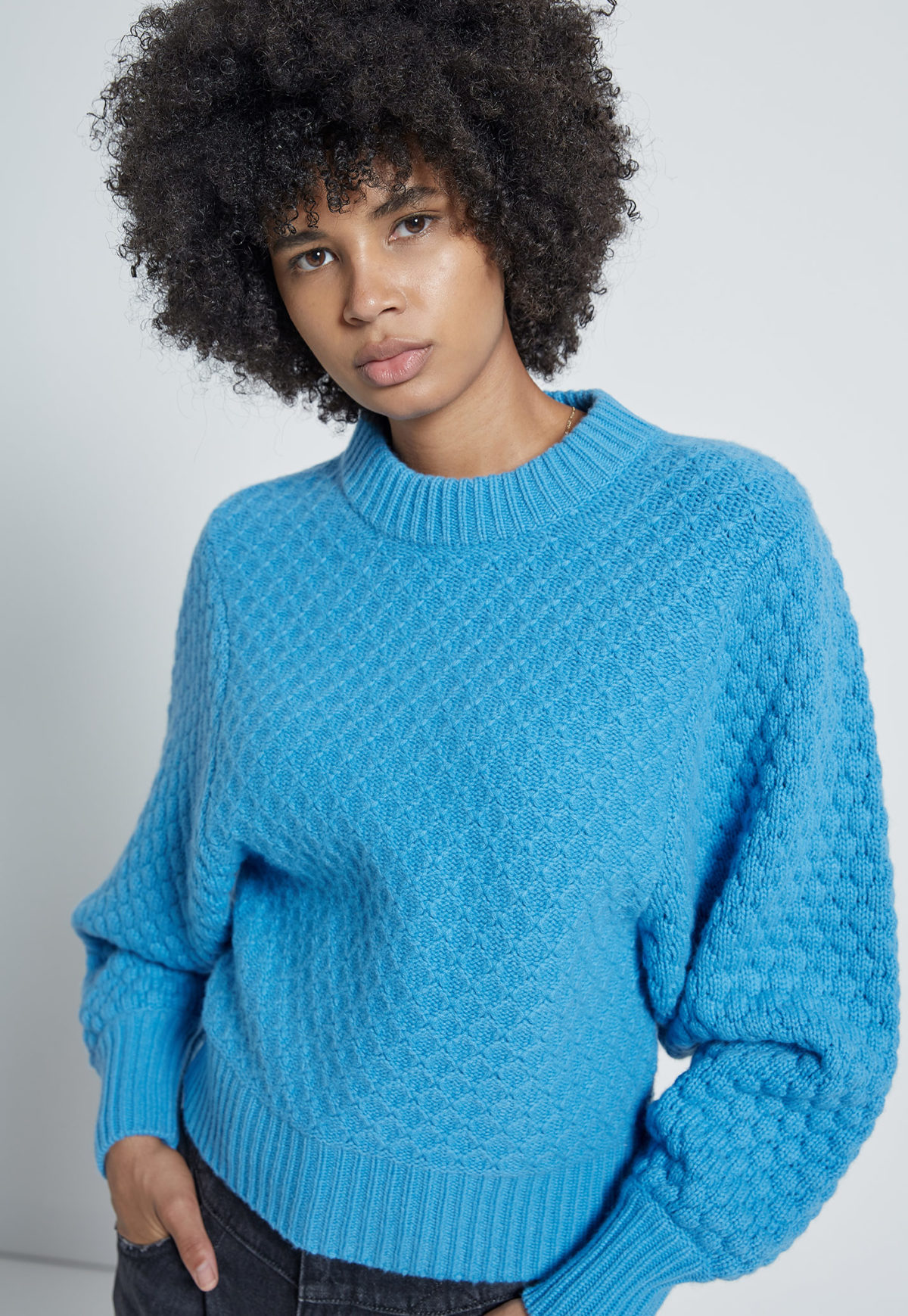 An aqua blue knit sweater