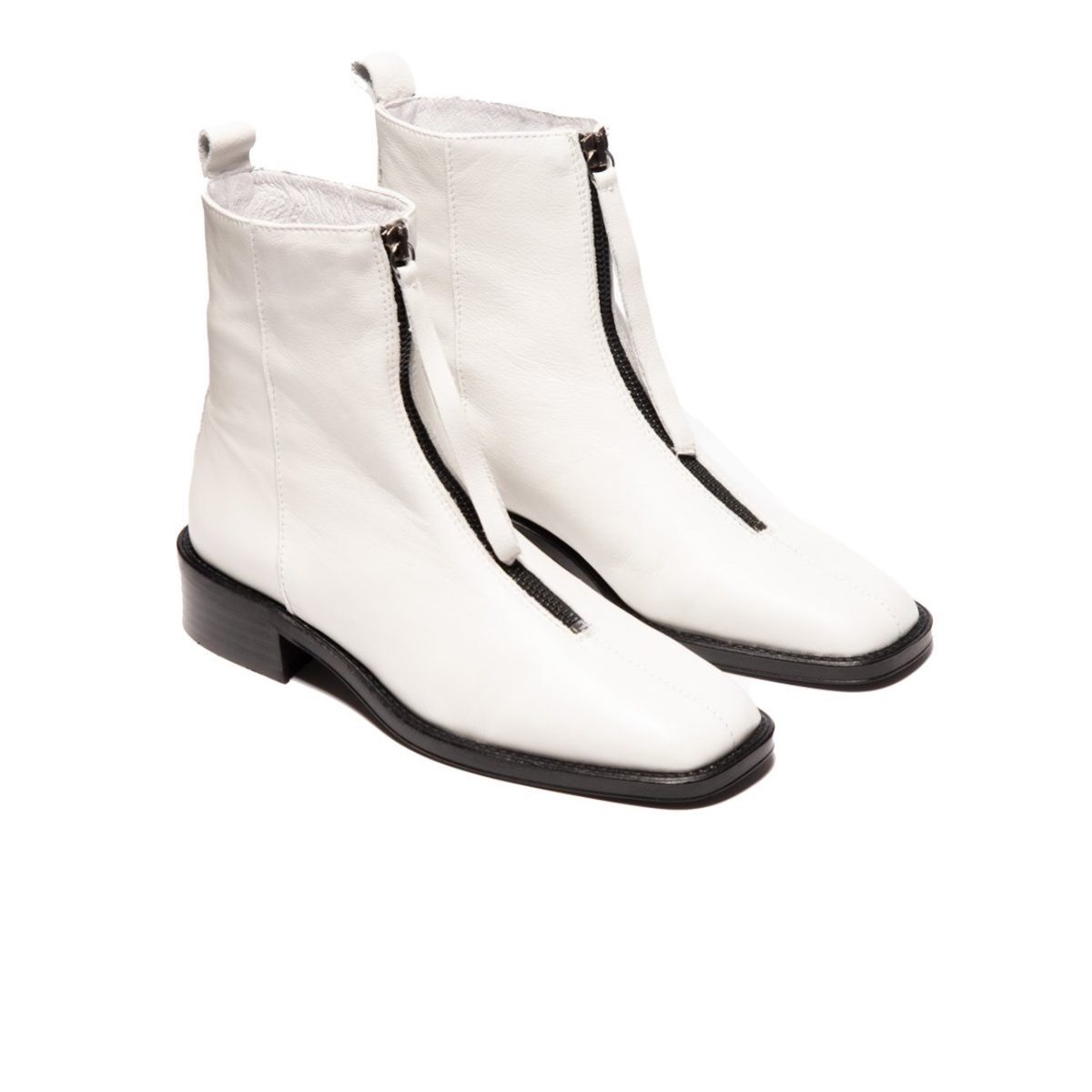 white leather boots with a zipper at the front